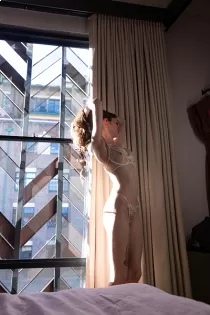 Escort Lucy Levine with brunette hair