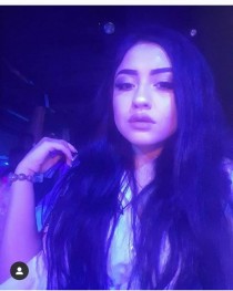 Escort UKRAINIAN ESCORTS IN DUBAI with black hair